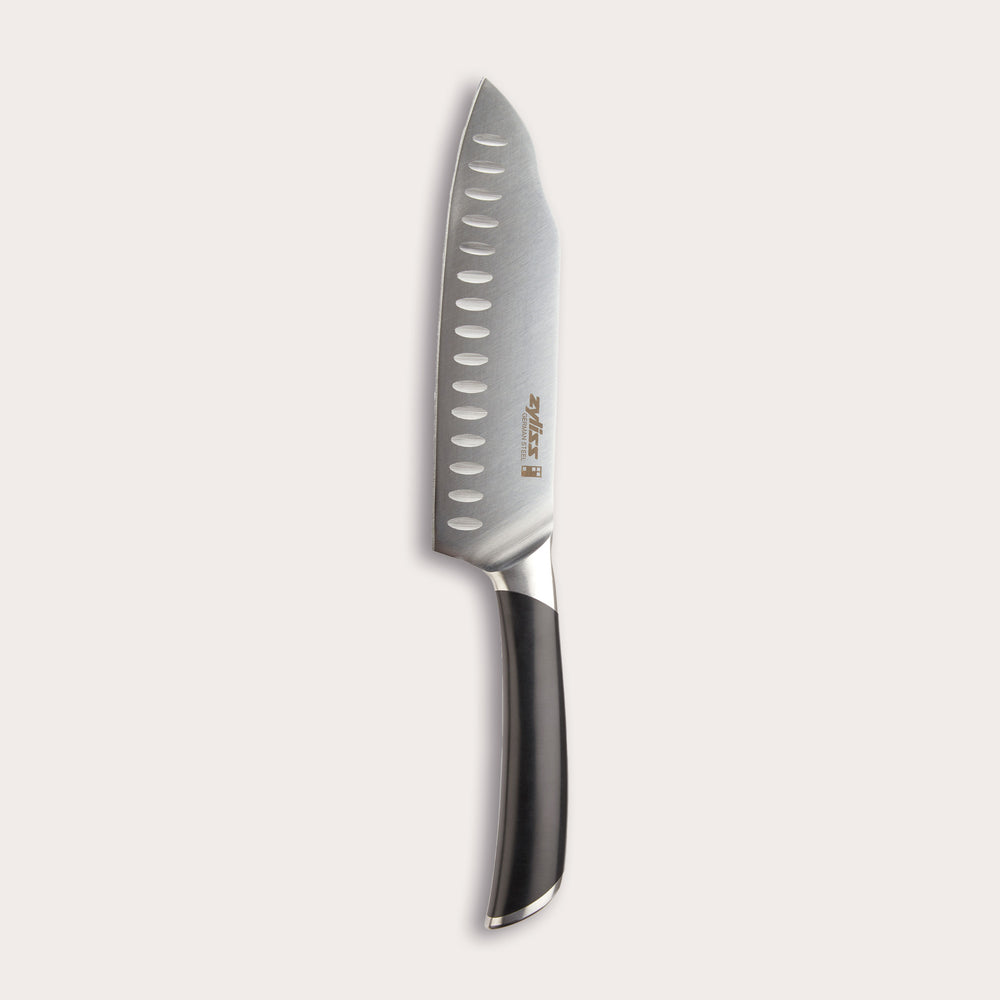 The Zyliss Comfort Pro Mini Santoku Knife 13cm / 5", made from German stainless steel and featuring a black ergonomic handle with oval indentations, is displayed on a plain light background.